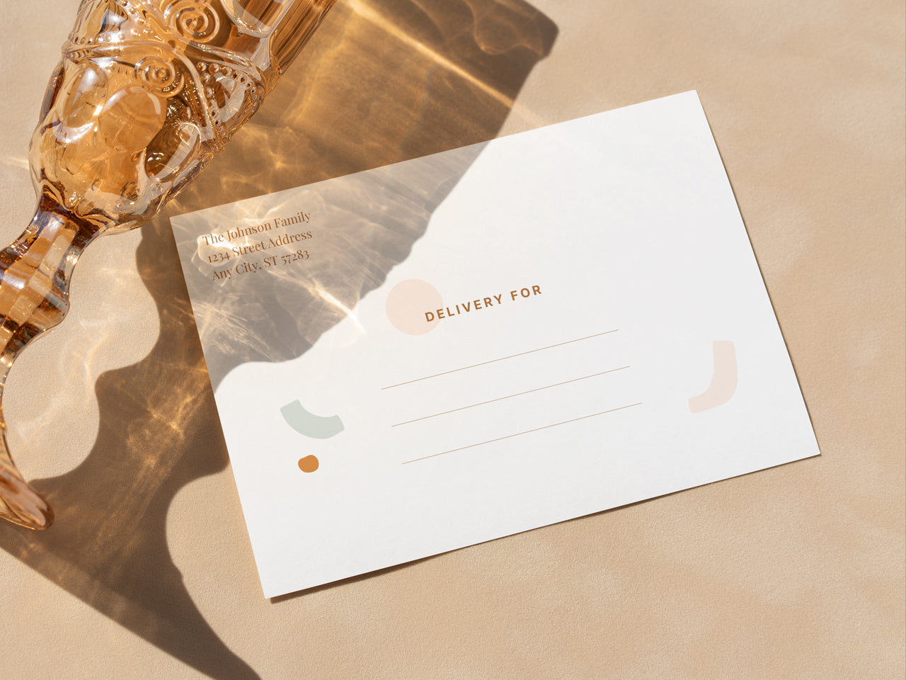 A boho graduation announcement envelope with a modern abstract design, featuring warm earthy tones and minimalist typography. The return address is printed in an elegant serif font. The card includes an area with, Delivery For, with space for handwritten details. Perfect for a personalized graduation announcement card or invitation. High-quality 5x7 printed grad announcement for high school or college graduates.