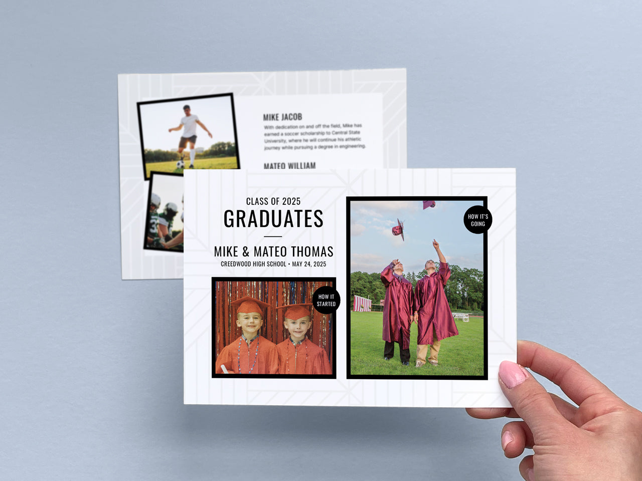 A person holding a printed twin graduation announcement card against a light blue background. The front design features a contemporary black and white layout with a geometric pattern, highlighting two photos: a childhood graduation picture and a senior year cap toss moment. The back of the card, partially visible, includes personalized text about the graduates, alongside additional photos of their accomplishments. The professional print finish gives it a premium feel.