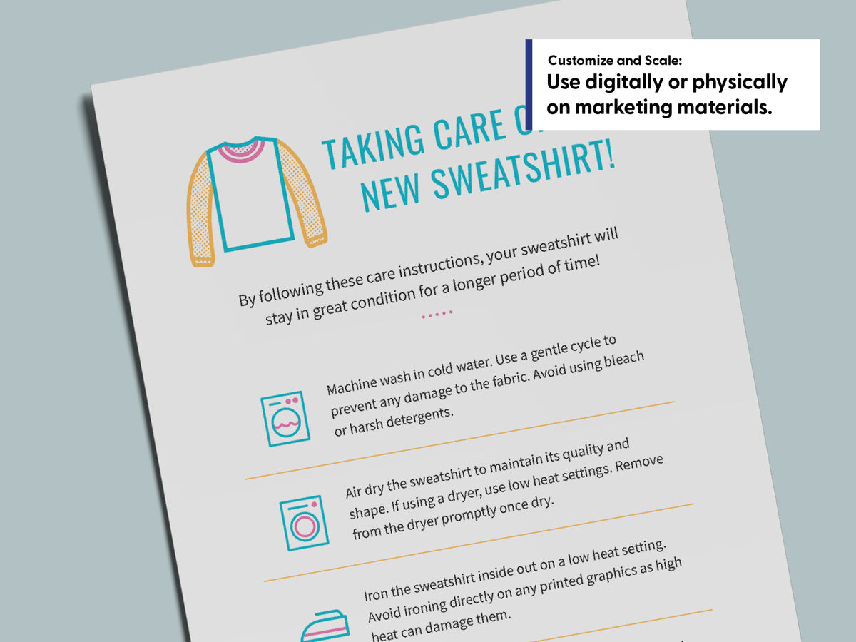 A printed care instruction sheet for a sweatshirt, shown at an angle on a light blue-gray background. The sheet includes a simple sweatshirt illustration and bullet points about washing, drying, and ironing.