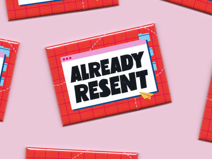 Multiple “Already Resent” office magnets displayed on a light pink background, featuring a retro email window design with bold black lettering and bright red, pink, and blue accents.