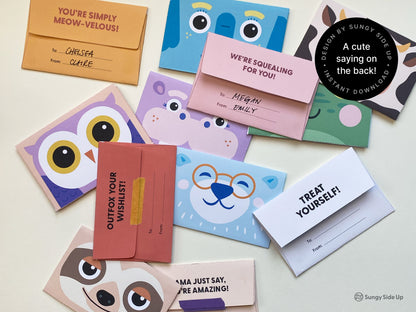 A collection of printable animal-themed gift card holders featuring cheerful animal faces like fox, sloth, owl, hippo, and frog. Each card holder includes a playful message on the back such as "Treat Yourself" or "You're Simply Meow-velous" with space to write names. The colorful designs are printed on cut-and-assemble templates, making them ideal for DIY gift wrapping. Perfect for birthdays, holidays, or special surprises, these cards are easy to personalize for any occasion.