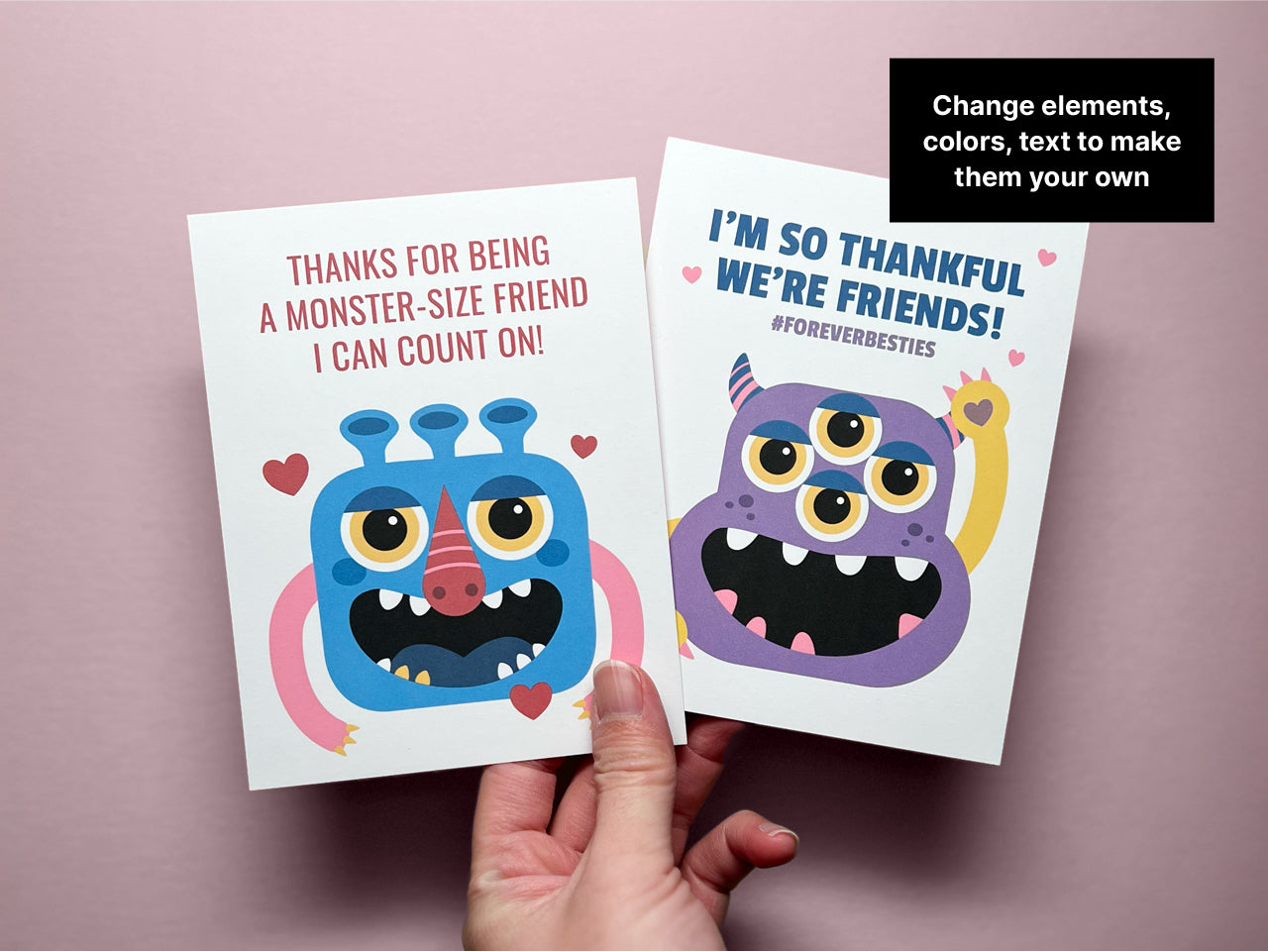 Two customizable printable cards displayed. The left card features an illustration of a blue monster with yellow eyes, red nose, and pink arms surrounded by red hearts. The right card features a purple monster with four eyes and yellow arms.