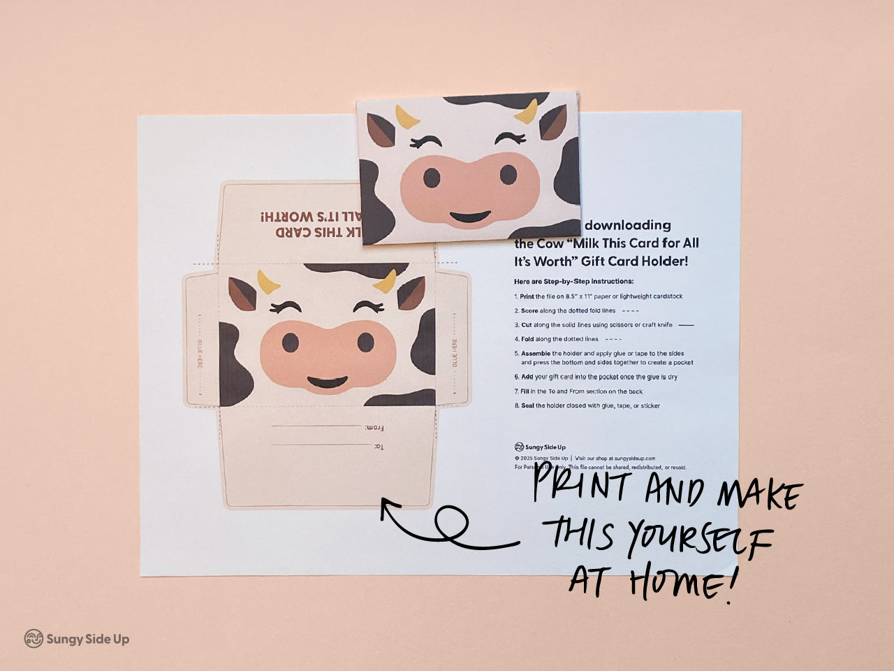 Printable cow gift card holder template displayed on a peach background with a fully assembled sample shown above. Black text encourages users to print and make the cardholder at home. This DIY farm animal-themed envelope is a digital download ideal for birthdays, baby showers, and teacher gifts. Easy to assemble, budget-friendly, and fun for creative gifting ideas. Designed for parents, party planners, and classroom use.
