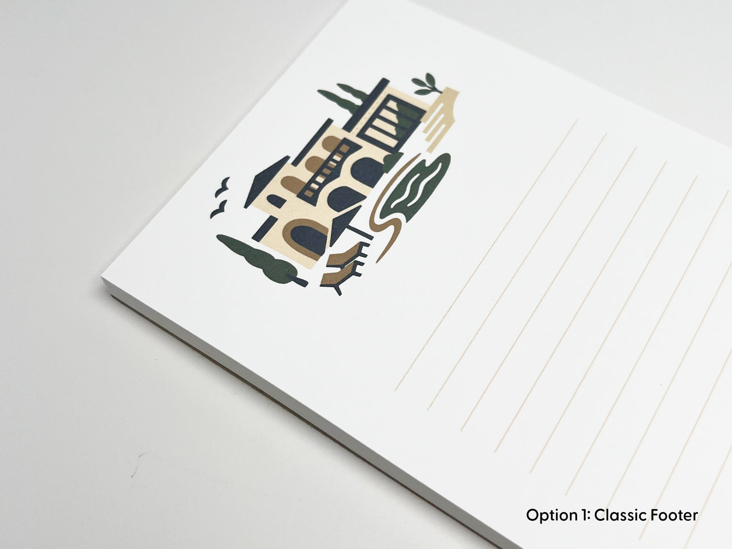 Angled close-up of personalized 4x6 real estate notepad with Mediterranean-style home illustration and lined writing space, designed as custom realtor stationery for client gifts and marketing.