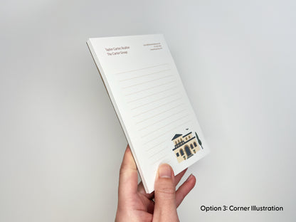 Hand holding personalized 4x6 real estate notepad in corner illustration layout, featuring custom realtor contact branding, lined writing space, and thick paper stack for client gifts and marketing.