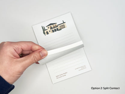 Hand peeling a page from personalized 4x6 real estate notepad, showing lined writing space, Mediterranean-style home illustration, and custom realtor branding for client gifts and marketing.