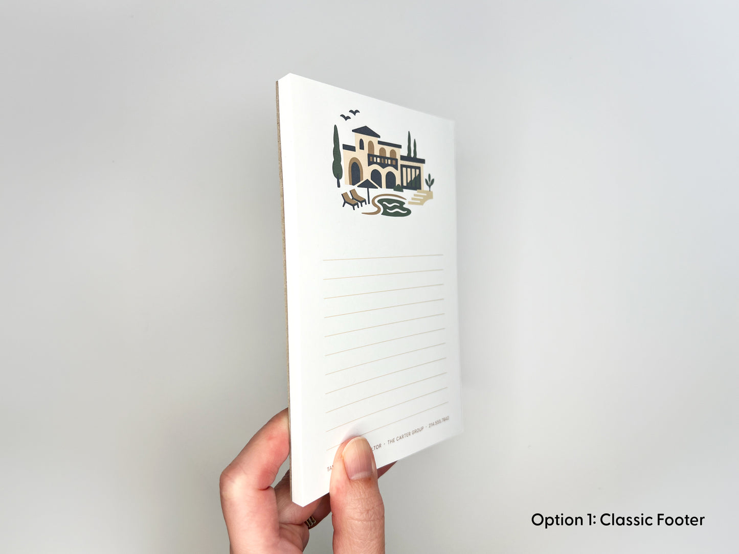 Side view of personalized 4x6 real estate notepad showing paper thickness, Mediterranean-style home illustration, and lined writing space for custom realtor stationery and closing gifts.