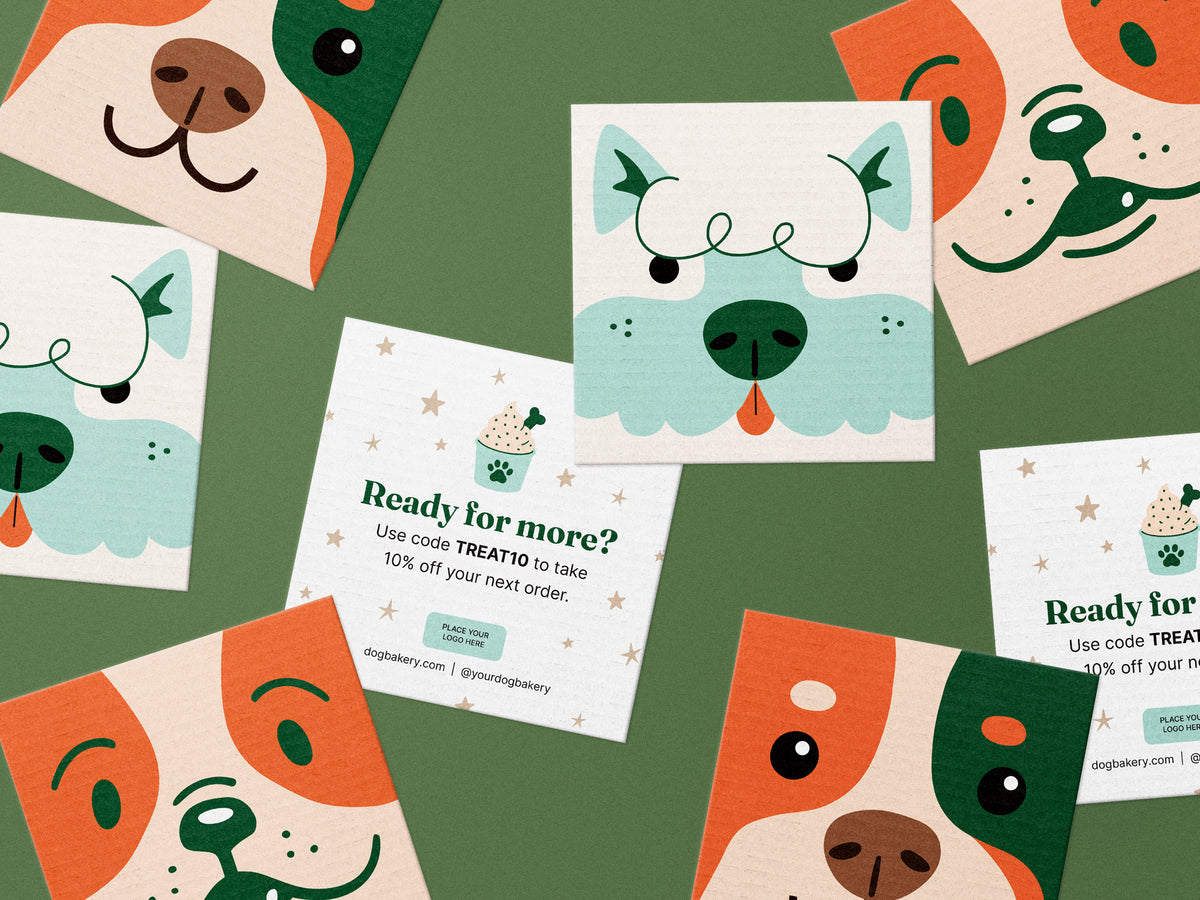Square dog bakery reorder card templates featuring three playful illustrated dog faces in orange, green, and mint, alongside an editable “Ready for more?” reorder card with a discount code and logo area.
