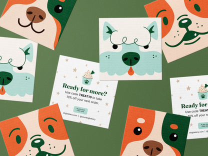 Square dog bakery reorder card templates featuring three playful illustrated dog faces in orange, green, and mint, alongside an editable “Ready for more?” reorder card with a discount code and logo area.
