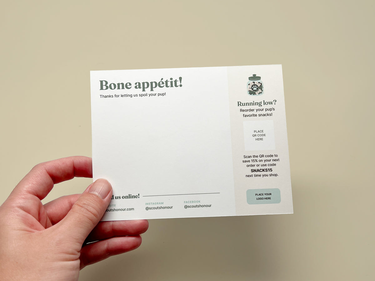 Editable dog bakery thank you card template with space for a personal message, QR reorder code, discount offer, logo, website, and social media.