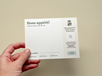 Editable dog bakery thank you card template with space for a personal message, QR reorder code, discount offer, logo, website, and social media.
