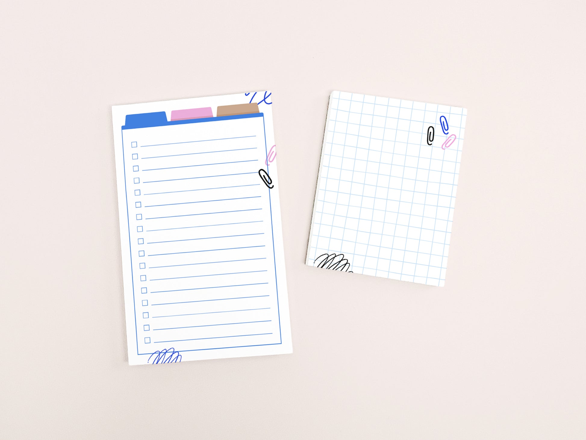A lined checklist notepad and a small grid notepad with colorful office-themed illustrations displayed side by side on a light background.