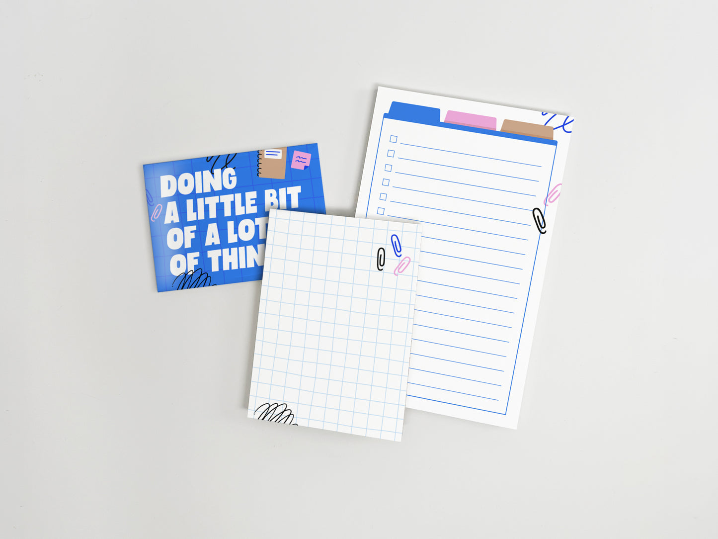 Funny coworker gift set featuring a "Doing a Little Bit of a Lot of Things" magnet, grid mini notepad, and lined to-do list notepad on a white background.