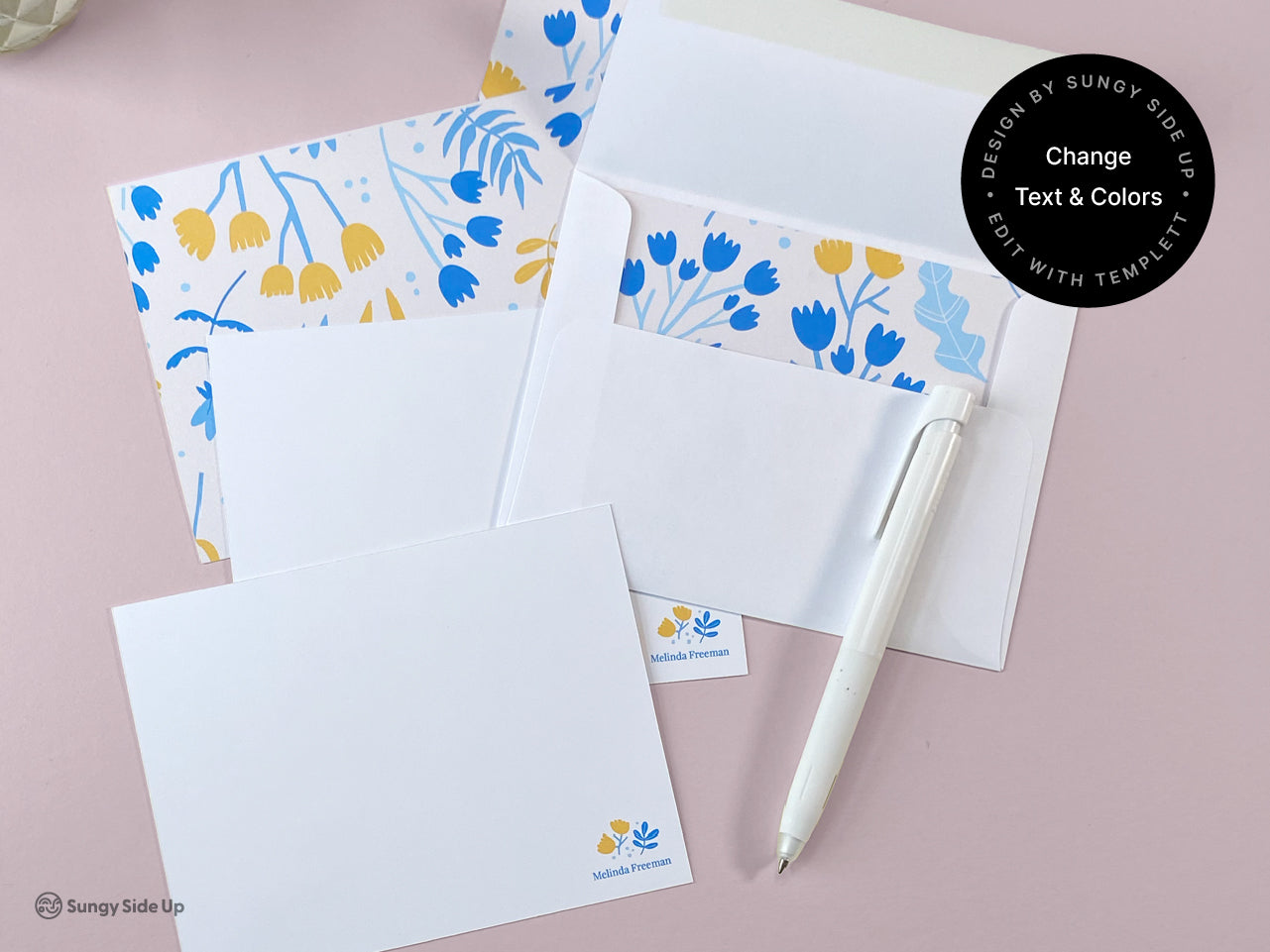 Editable floral stationery set showing flat note card and open envelopes with vibrant blue and yellow flower-patterned liners. Includes 3 customizable card and envelope templates. Design editable via Templett to change names, colors, and fonts. Ideal for personalized thank you notes, happy mail, or thoughtful gifts. Perfect for printing at home or professionally. Designed by Sungy Side Up.