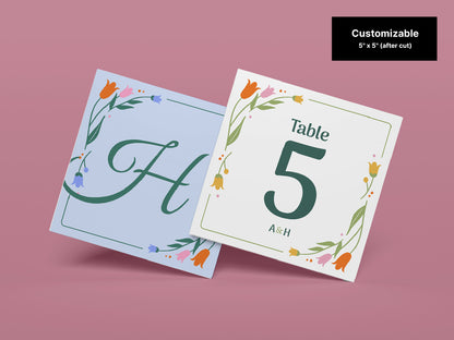 Elegant floral table number and monogram templates on a pastel pink background. The template showcase vibrant floral illustrations and greenery designs, ideal for enhancing wedding seating arrangements, event signage, and personalized decor.