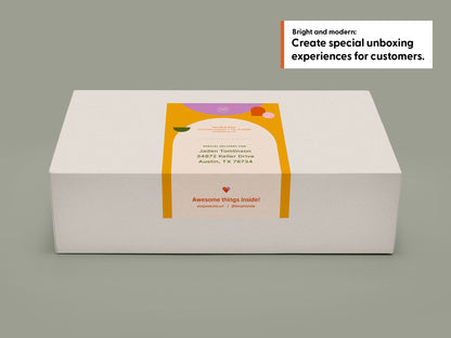 A white rectangular shipping box with a colorful orange, yellow, and purple label, shown on a solid light olive green background.