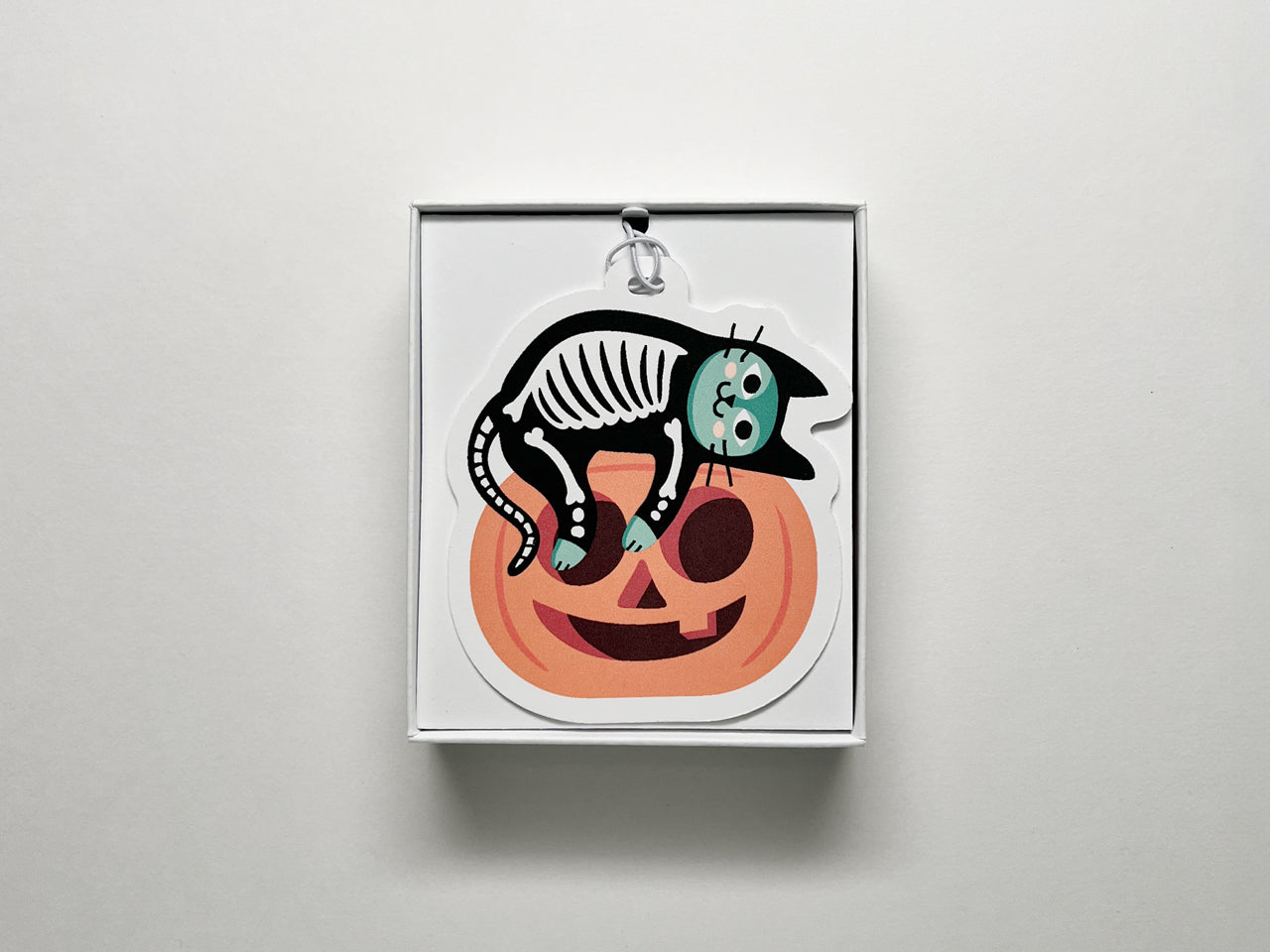 Set of 12 handmade gift tags are packaged in a white box.