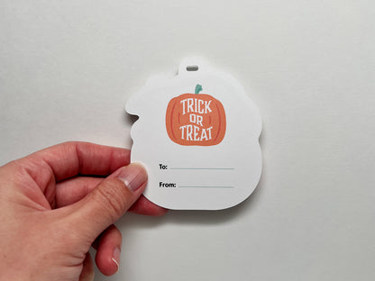 Illustration of an orange pumpkin with "trick or treat" and space to include the recipient's name.