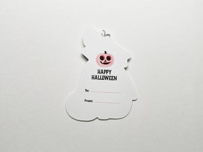 Back of gift tags features an illustration of a pink jack-o-lantern, text that reads, "Happy Halloween," and a space to include recipient's name.