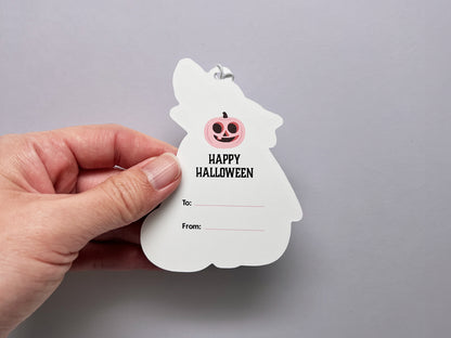 Back of handmade gift tag with "Happy Halloween" and pink jack-o-lantern.