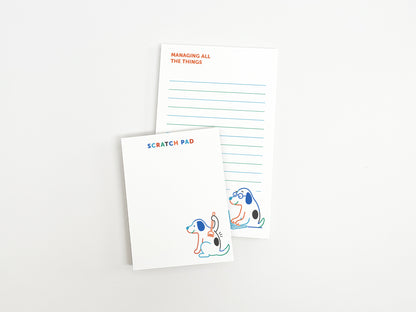 Matching "Managing All the Things" notepad and scratch pad set with cute dog illustrations for notes, reminders, to-do lists, and desk organization.