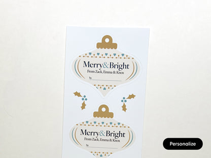 Ivory gift labels shaped as an ornament with accents of blue and gold.