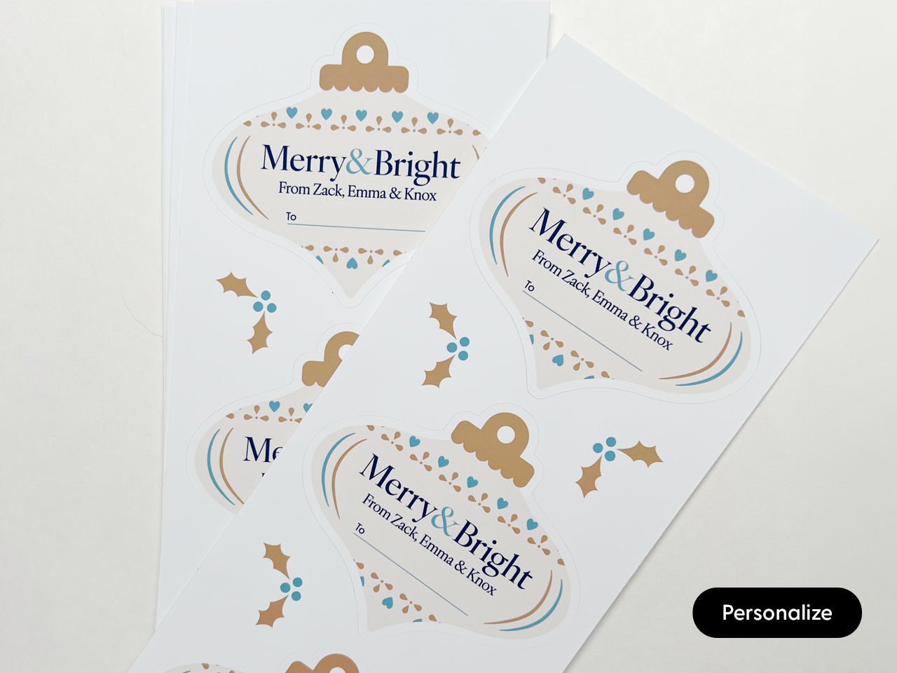 Close up of personalizable Merry & Bright holiday ornament gift labels.