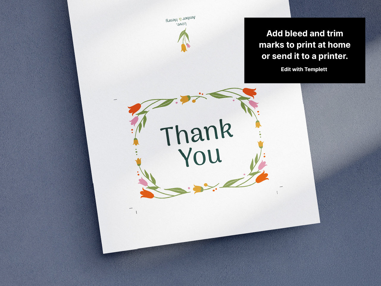 Customizable modern floral thank you card template with bleed and trim marks displayed on a flat sheet for printing. Features an elegant floral border with orange and pink flowers and green leaves. Editable via Templett.