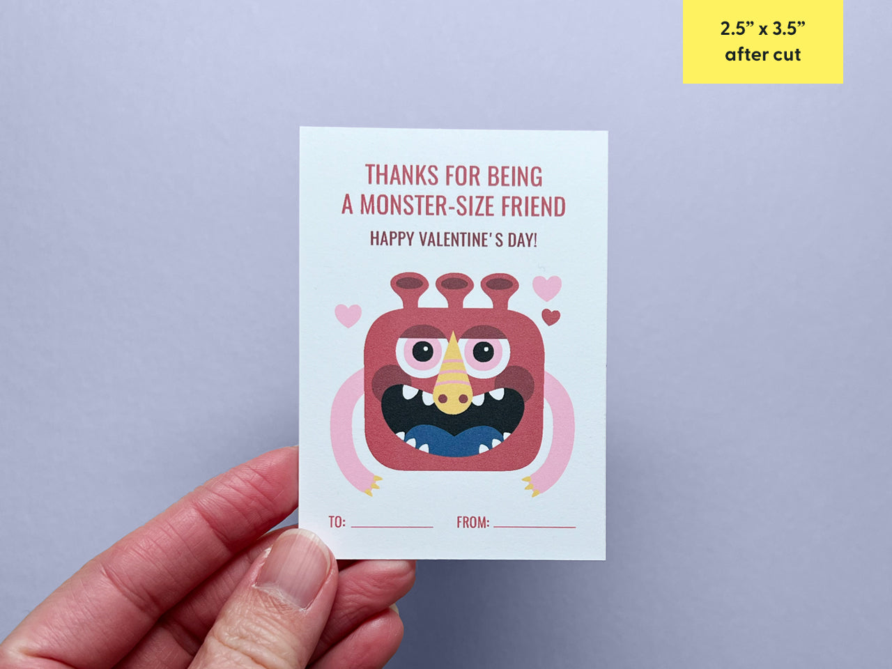 A close-up of a red monster-themed Valentine card with a Valentine message in red. The card features a quirky red monster illustration and customizable To and From fields. A label indicates that the card is 2.5 x 3.5 inches aftercut out.