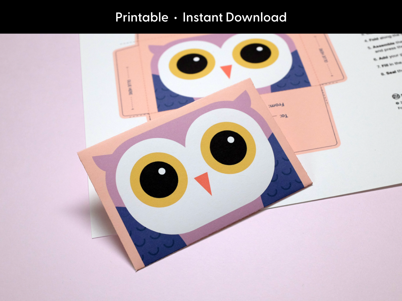 Printable owl gift card holder for graduation or teacher appreciation featuring a cute cartoon owl in purple and peach. Finished DIY card is displayed in front of a flat template sheet printed on 8.5 x 11 inch paper. Ideal digital download for parents, teachers, and kids looking for a quick and easy gift card presentation. Perfect for home printing and classroom celebrations.