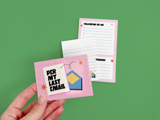 Hand holding a funny "Per My Last Email" office magnet in front of matching checklist and lined notepads, perfect for coworker gifts and office desk accessories.