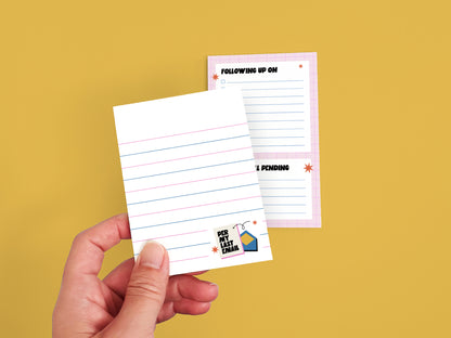 Hand holding a lined office notepad in front of a matching "Following Up On" checklist pad, perfect for coworker gifts, meeting notes, and desk organization.