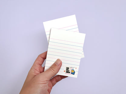 Hand holding two "Per My Last Email" 3x4 mini lined notepads with 50 tear-off sheets, funny office stationery for coworkers.