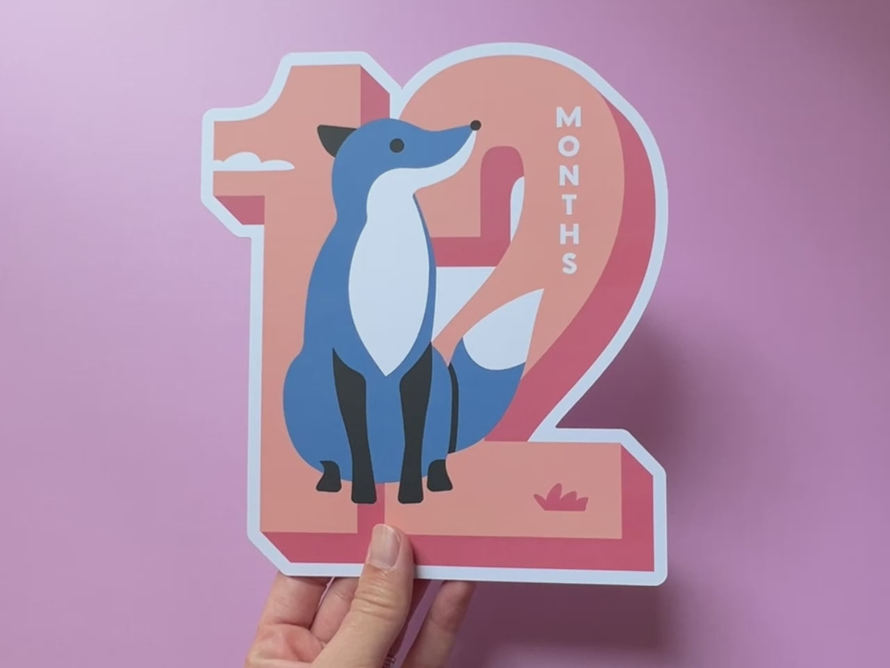 12 Months features a blue fox and showcases the contents of the back side of card.