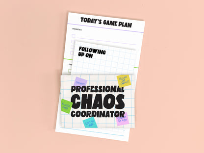 Professional Chaos Coordinator stationery gift set featuring a funny office magnet, follow-up mini notepad, and Today's Game Plan planner notepad arranged on a blush pink background.
