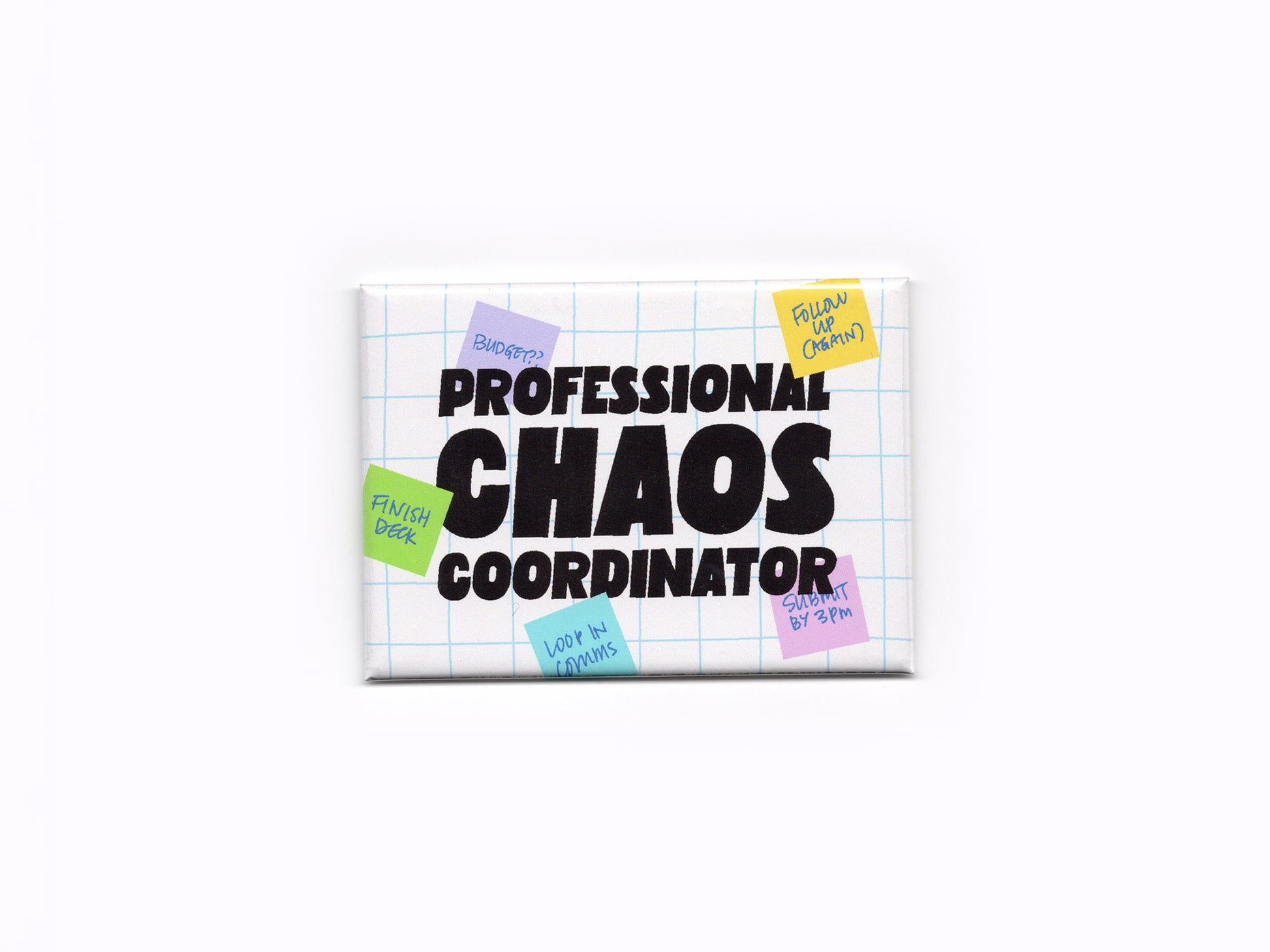 Rectangular white magnet with a light blue grid pattern and bold black text that reads “Professional Chaos Coordinator.” Small colorful sticky notes with handwritten reminders surround the text on the magnet.