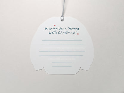 The back of a Christmas sweater gift tag with a space for a handwritten note. The message at the top reads, "Wishing You a Merry Little Christmas!" with lines below for neat writing. The background is a clean white, highlighting the design.