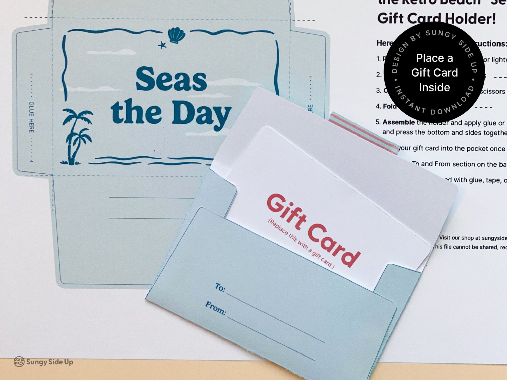 Printable gift card holder with a tropical beach theme in shades of blue shown assembled and unassembled on a flat surface. Includes palm tree illustrations and ocean inspired design. A gift card is partially inserted into the pocket to show fit. Instructions for use are printed on the background sheet. Ideal for summer gifts thank you cards birthdays and DIY projects. Digital file for instant download and easy at home assembly.