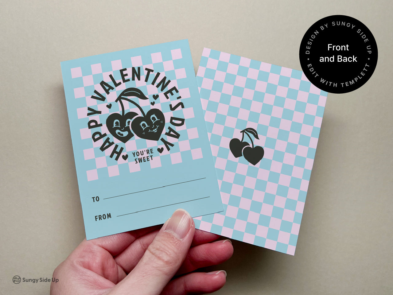 A close-up of customizable Valentines Day card printables in retro style, displayed with front and back view of the vintage design. Features a vintage cherry motif on a pastel checkered background, ideal for unique and creative Valentines Day notes.