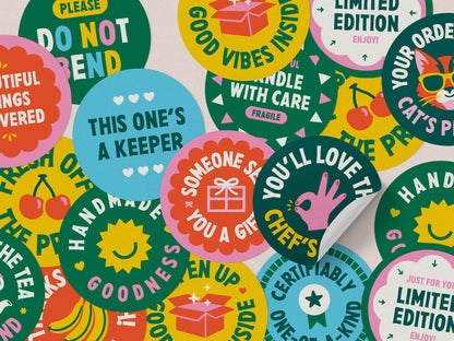 Colorful round small-business packaging stickers with playful messages, including “Handle with care” and “Limited edition.”