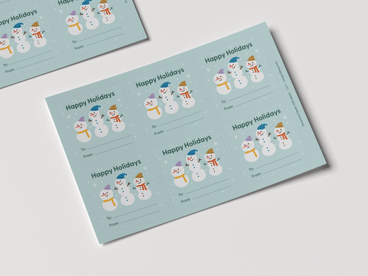 Sheet of snowman family holiday gift labels.