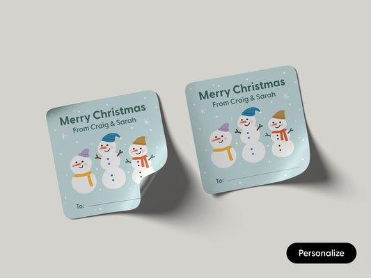 Wintergreen-colored square holiday gift labels with a snowman family.