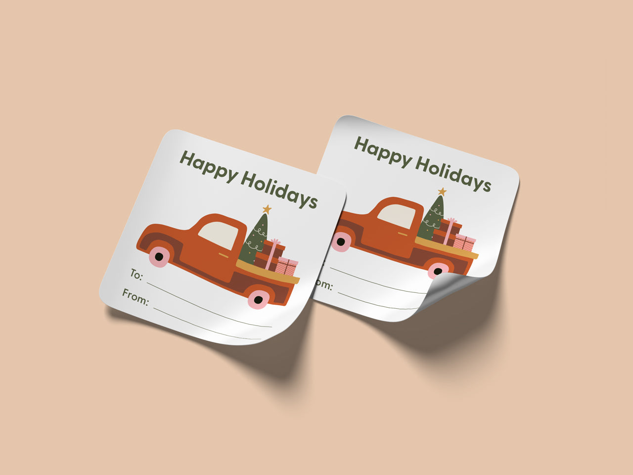 Two rounded corner square stickers featuring a vintage truck with Christmas tree.